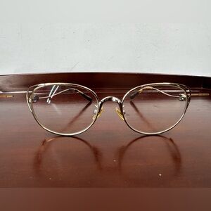 Coach glasses HC 5095 (light gold). These are a modern, cat-eye style Frame only